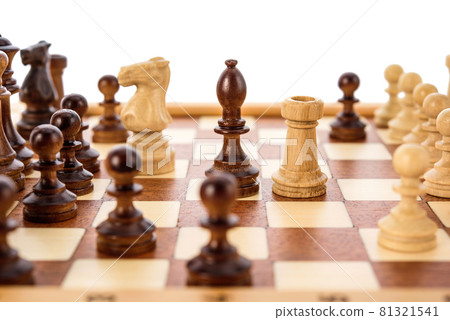 Classic Wooden chess pieces on chessboard Classic Wooden chess pieces on chessboard 81321541