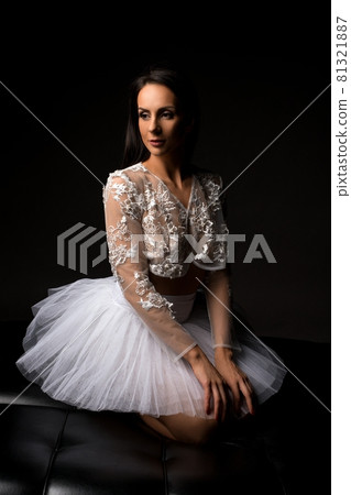 Graceful young woman in white wedding dress 81321887