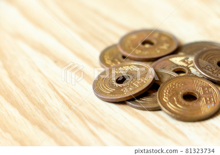 Close-up of a 5-yen coin with a hole Close-up of a 5-yen coin with a hole 81323734