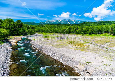 Daisetsuzan and Ishikari River with residual snow in Hokkaido Daisetsuzan and Ishikari River with residual snow in Hokkaido 81324863