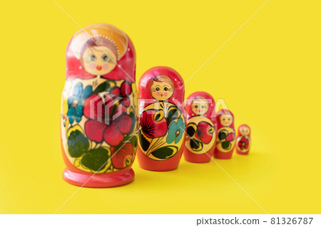 Matryoshka doll set in a row isolated. A symbol of the feminine side of Russian traditional and culture. Wooden doll toys. Crafts, painting and art. 81326787
