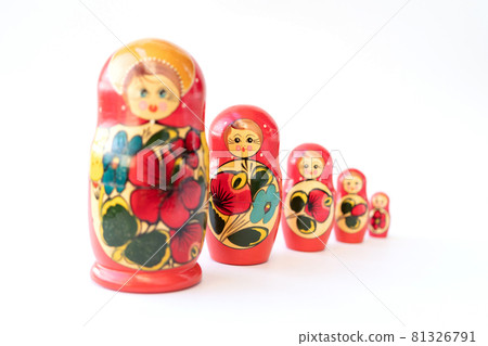 Matryoshka doll set in a row isolated. A symbol of the feminine side of Russian traditional and culture. Wooden doll toys. Crafts, painting and art. Matryoshka doll set in a row isolated. A symbol of the feminine side of Russian traditional and culture. Wooden doll toys. Crafts, painting and art. 81326791