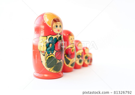 Matryoshka doll set in a row isolated. A symbol of the feminine side of Russian traditional and culture. Wooden doll toys. Crafts, painting and art. 81326792