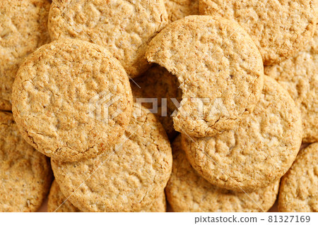 sweet cookies on orange color background. sweet cookies on orange color background. 81327169