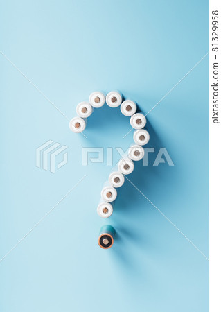 AA rechargeable batteries in the form of a question mark on a blue background with free space 81329958