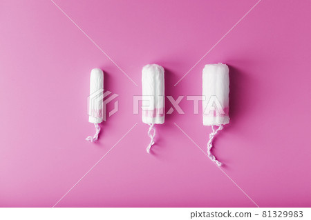 Gynecological tampons on a pink background free space Gynecological tampons on a pink background free space 81329983