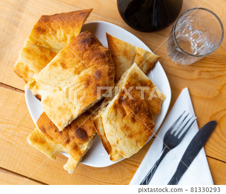 Traditional georgian bread shotis puri served for dinner Traditional georgian bread shotis puri served for dinner 81330293