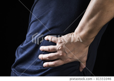 A man holding his waist with his hand 81331046
