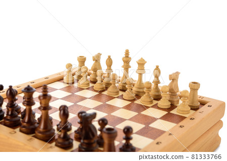 Classic Wooden chess pieces on chessboard 81333766