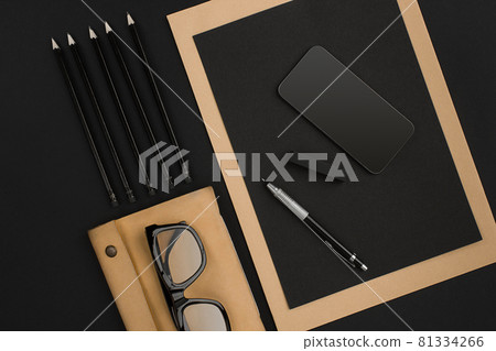 Mix of office supplies on a modern desk 81334266