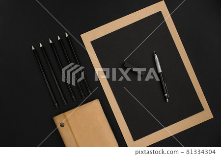 Mix of office supplies on a modern desk 81334304
