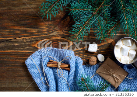 Christmas drink. Mug hot coffee with marshmallow on the wooden background. New Year. Christmas drink. Mug hot coffee with marshmallow on the wooden background. New Year. 81336330