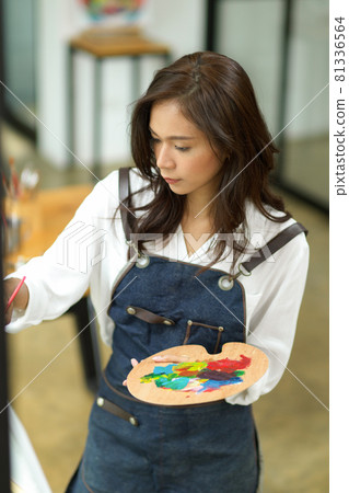 Portrait of female painter, painting art piece with oil colour 81336564