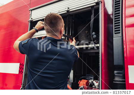 Firefighter with special instruments for ambulance firefighting 81337017