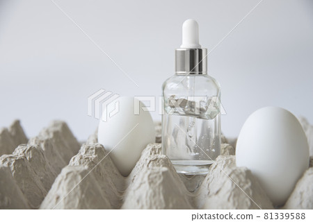 Glass bottle of egg serum for face. Glass bottle of egg serum for face. 81339588