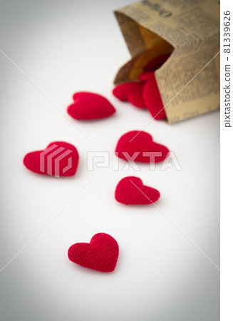 Heart spilling from the bag Paper bag English newspaper Red 81339626