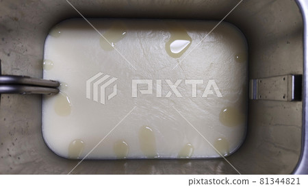 solid oil in stainless deep fryer pot, industrial cooking wax, special oil to fry Doughnut, advertising backgrounds 81344821