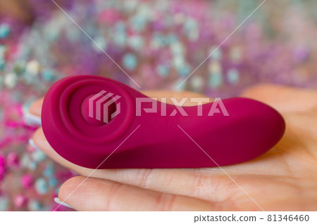 Girl's hand holds a massager for sex. Vibrator... - Stock Photo [81346460]  - PIXTA
