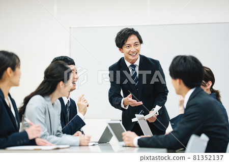 Business person discussing at a meeting Business person discussing at a meeting 81352137