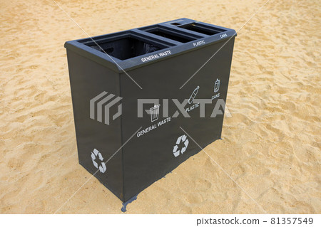 An outdoor public garbage bin on a beach in Dubai 81357549