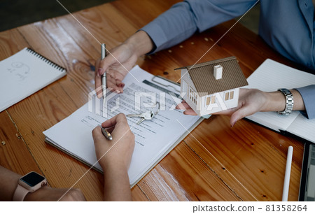 legal consultants, notary or justice lawyer discussing contract document on desk with client customer in courtroom office, business, justice law, insurance, legal service, buy and sell house concept legal consultants, notary or justice lawyer discussing contract document on desk with client customer in courtroom office, business, justice law, insurance, legal service, buy and sell house concept 81358264