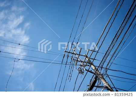 Blue sky, electric wires, utility poles, fine weather, infrastructure, electric power, communication Blue sky, electric wires, utility poles, fine weather, infrastructure, electric power, communication 81359425