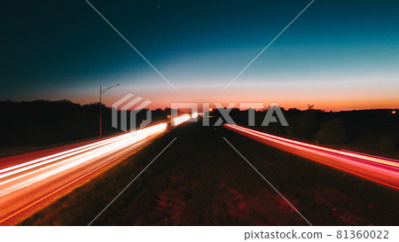 Night road lights. Lights of moving cars at night. long exposure multicolored 81360022