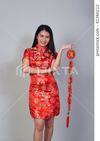 Beautiful young asian woman wearing wear chinese dress 81360212