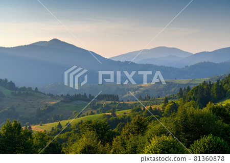 Amazing mountain landscape with colorful vivid sunset on the cloudy sky Amazing mountain landscape with colorful vivid sunset on the cloudy sky 81360878