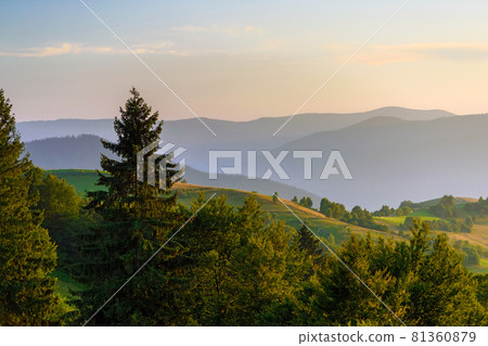 Amazing mountain landscape with colorful vivid sunset on the cloudy sky 81360879