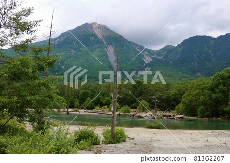 Mount Yake over the Azusa River and Lake Taisho in Kamikochi, a highland valley within the Chubu-Sangaku National Park in the Hida Mountains range of the Japanese Alps in Nagano Prefecture, Japan 81362207