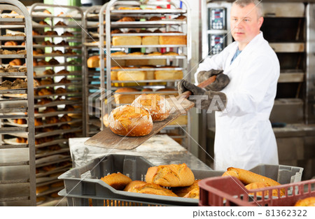 Usual work of baker in a bakery Usual work of baker in a bakery 81362322