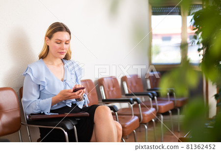 Woman waiting for job interview at office 81362452