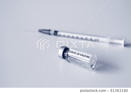 Vial of Covid-19 vaccine and 1 ml plastic syringe with needle isolated on the white background Vial of Covid-19 vaccine and 1 ml plastic syringe with needle isolated on the white background 81363180