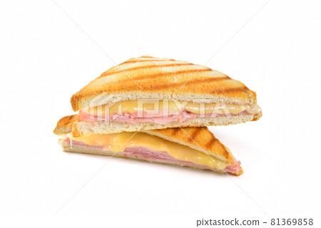 Pressed and toasted sandwich with ham and cheese on white background 81369858
