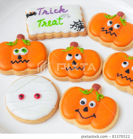 Happy Halloween day with funny Cookies, different Pumpkin biscuits on plate. Trick or Threat, Hello October, fall autumn, Traditional, party and holiday concept 81370522