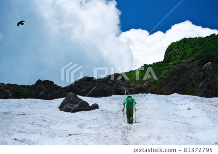 Summer skiing above the clouds at the bottom of the Norikura Taisetsu Valley Summer skiing above the clouds at the bottom of the Norikura Taisetsu Valley 81372795