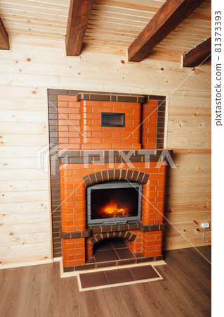 brick fireplace in wooden house brick fireplace in wooden house 81373393