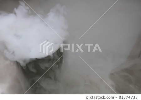 White smoke from dry ice in water White smoke from dry ice in water 81374735