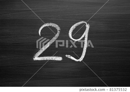 number twenty nine enumeration written with a chalk on the blackboard 81375532