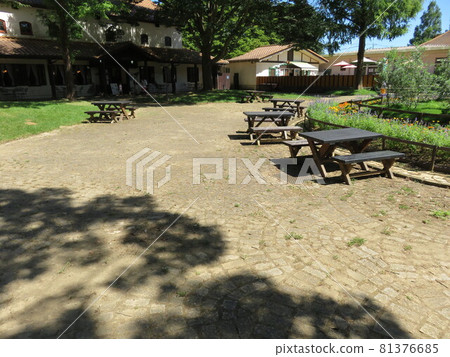 Tables and chairs on the cobblestones Tables and chairs on the cobblestones 81376685