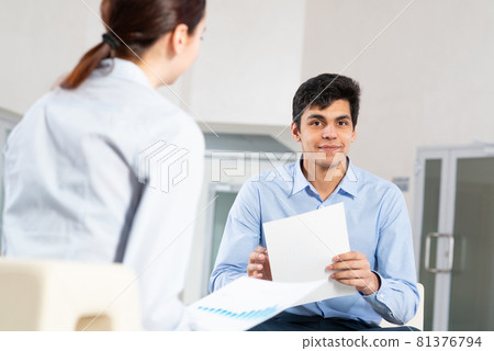 portrait of a young man at a business meeting 81376794