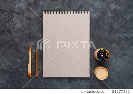 Blank grey cardboard notebook mockup pastel pad dark background flat lay. Minimal work space sketchbook notepad Blank grey cardboard notebook mockup pastel pad dark background flat lay. Minimal work space sketchbook notepad 81377832