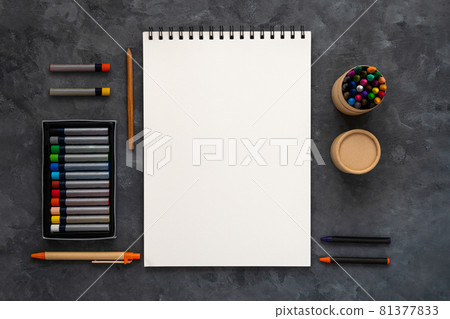 Blank notebook mockup pastel pad dark background flat lay. Minimal work space sketchbook notepad template, art drawing. Blank notebook mockup pastel pad dark background flat lay. Minimal work space sketchbook notepad template, art drawing. 81377833
