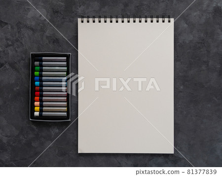 Blank notebook mockup pastel pad dark background flat lay. Minimal work space sketchbook notepad template, art drawing. Blank notebook mockup pastel pad dark background flat lay. Minimal work space sketchbook notepad template, art drawing. 81377839