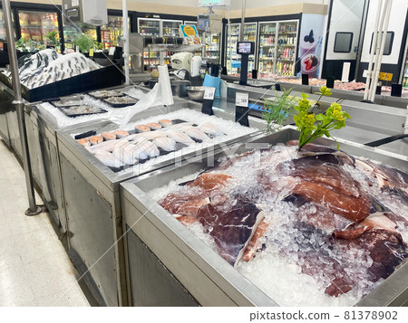 Tesco Lotus,THAILAND- August 25, 2021 : Variety of fresh meat, Fresh fish and seafood are placed in trays or on crushed ice, Fresh food products in famous department stores. Food in the mall. 81378902