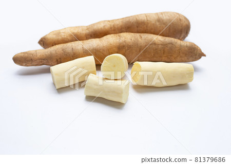Cassava on a white background. Cassava on a white background. 81379686