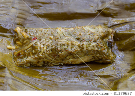 Steamed Bamboo shoots in banana leaf Steamed Bamboo shoots in banana leaf 81379687