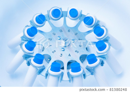 Blood in centrifuge. Platelet-Rich plasma preparation. Tubes with blood in Centrifuge. Blue tonned image 81380248