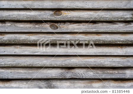Wooden barn wall made of boards. 81385446